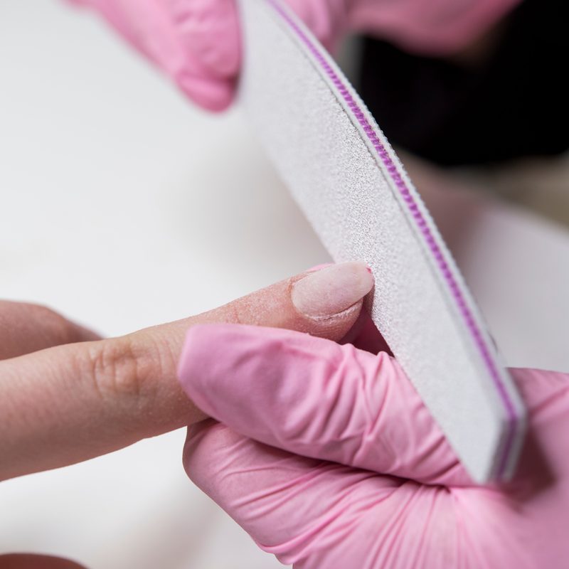 Close-up of manicure dust produced during nail filing