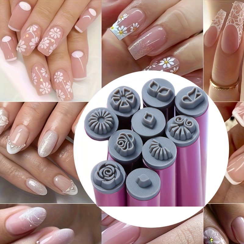 collection of nail art dotting tools and stamping plates