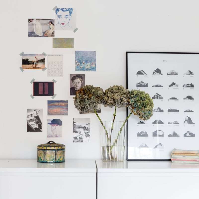 Colorful washi tape used to hang art on a wall without nails