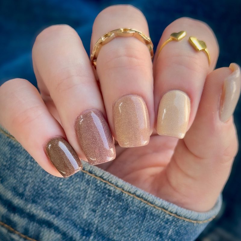 fall-inspired coffee nail art with warm browns and orange accents