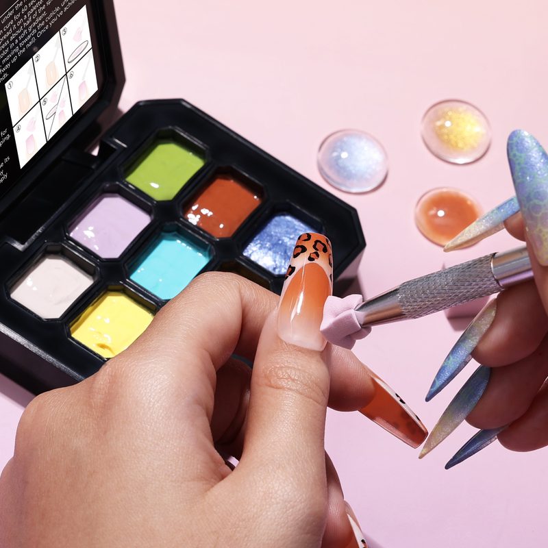 selection of colorful gel nail art paint bottles for various styles