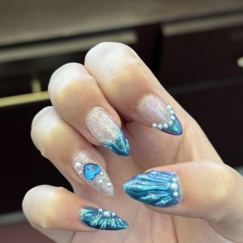 side by side image showing DIY and professional prom nail art designs