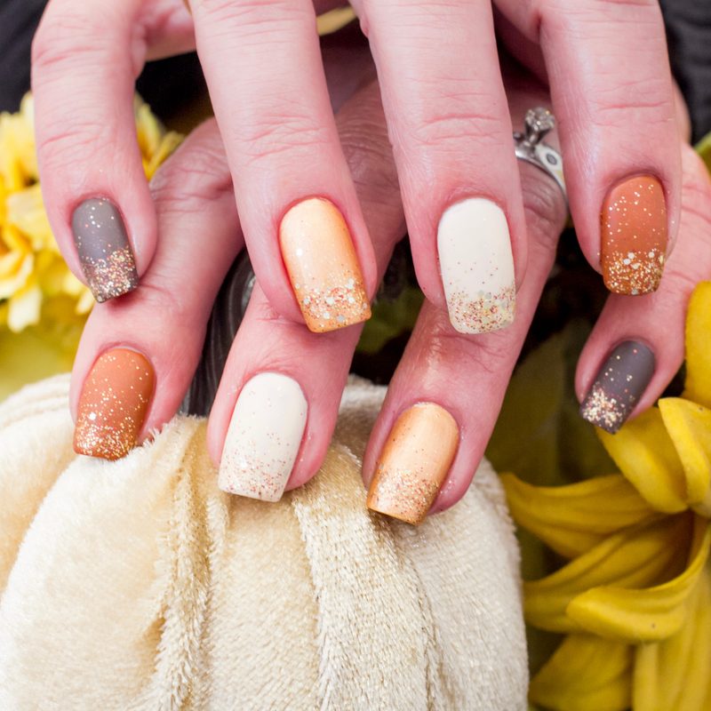 Step-by-step DIY art deco nail design with striping tape and metallic polish