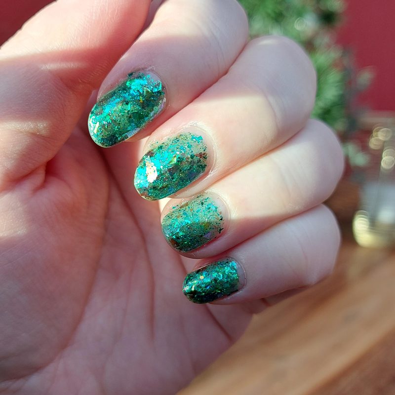 variety of glitter nail polish colors including gold, silver, and red
