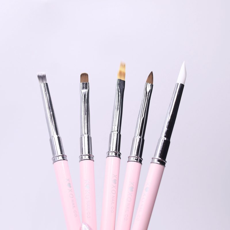 various nail art brushes including fine liners and flat brushes