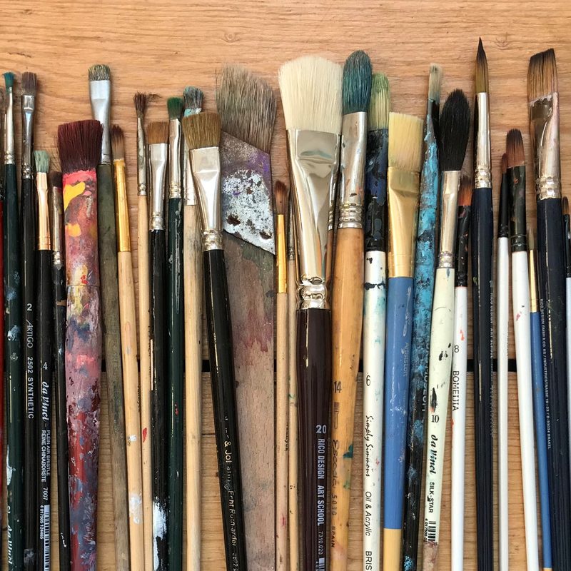 various types of nail art brushes including liner, flat, and dotting brushes