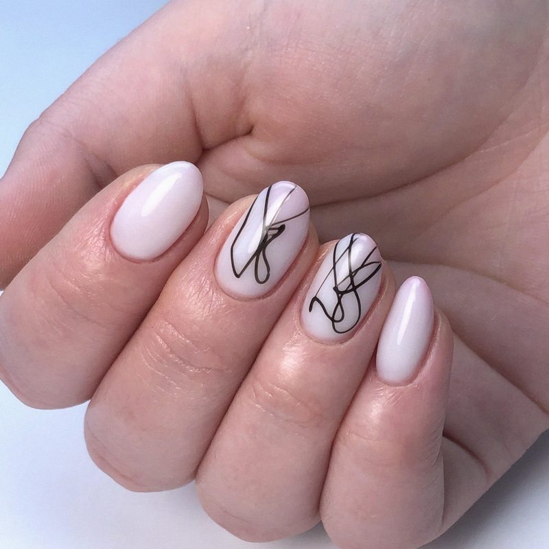 abstract spider gel nail art with vibrant colors