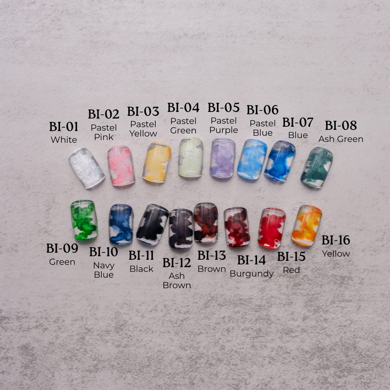 assorted bottles of nail art inks with various vibrant colors