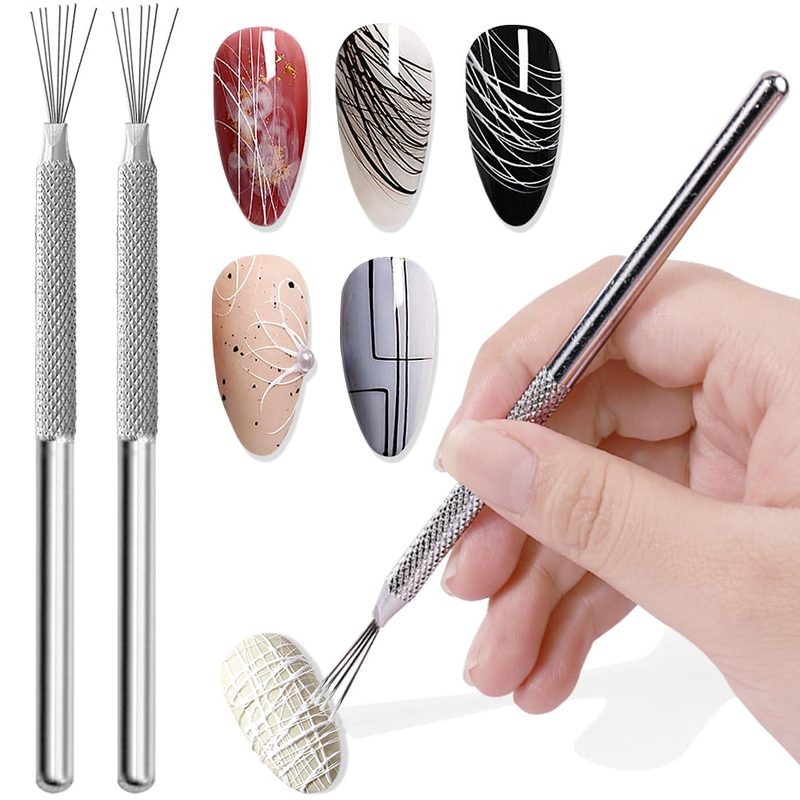 assortment of nail art tools including brushes, rhinestone glue, and gel polish