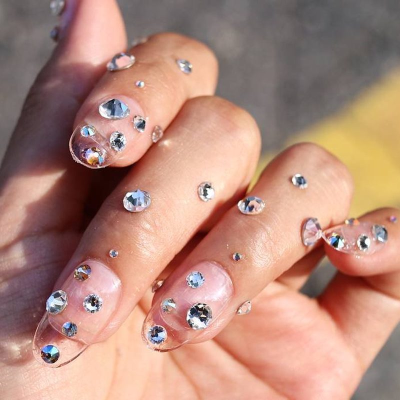 care routine for rhinestones on nails with top coat
