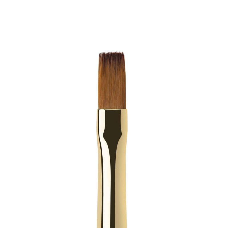 Close-up of a high-quality flat nail art brush with synthetic bristles