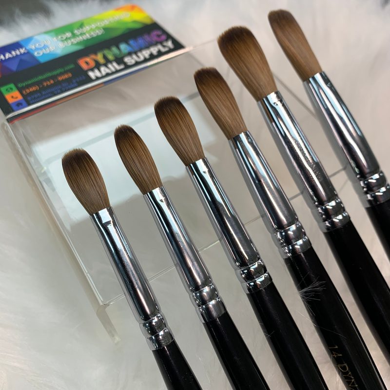 close-up of a professional nail art flat brush with fine bristles used for nail art techniques