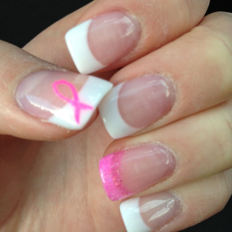 close-up of breast cancer ribbon nail art showcasing symbolic pink ribbon design