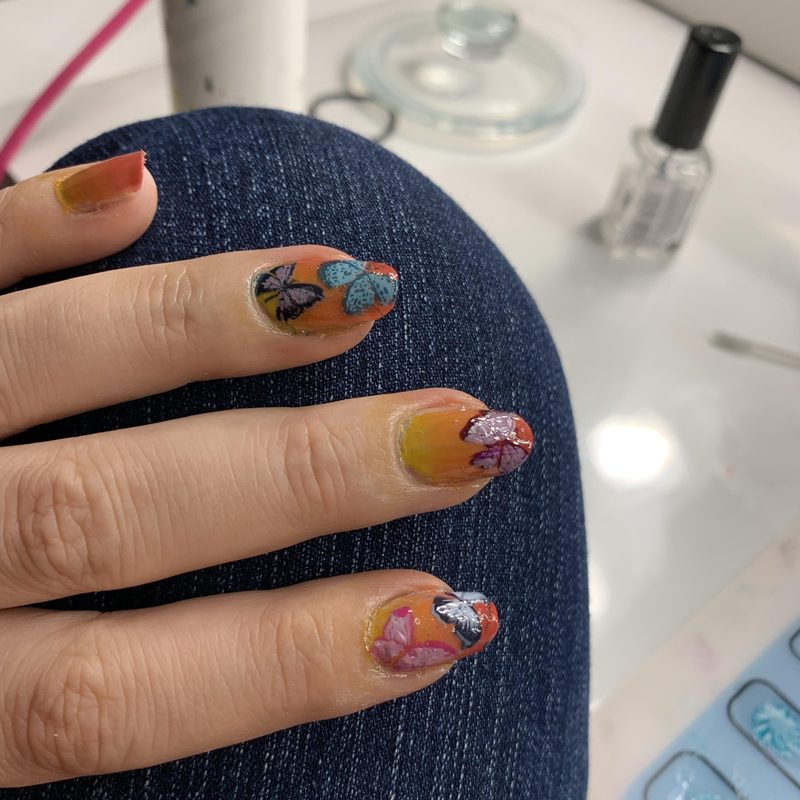 close-up of nail art stamping using a nail polish art set