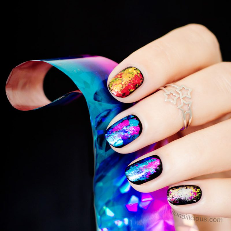 close-up of well-maintained foil manicure with shiny top coat