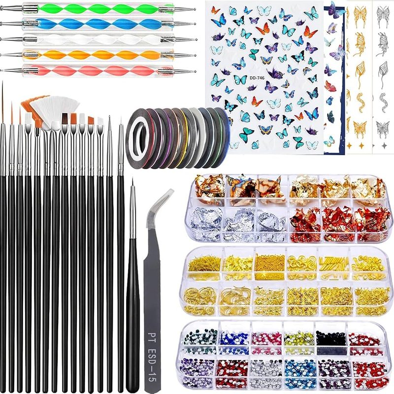 collection of fine nail art brushes and dotting tools used for 3d designs