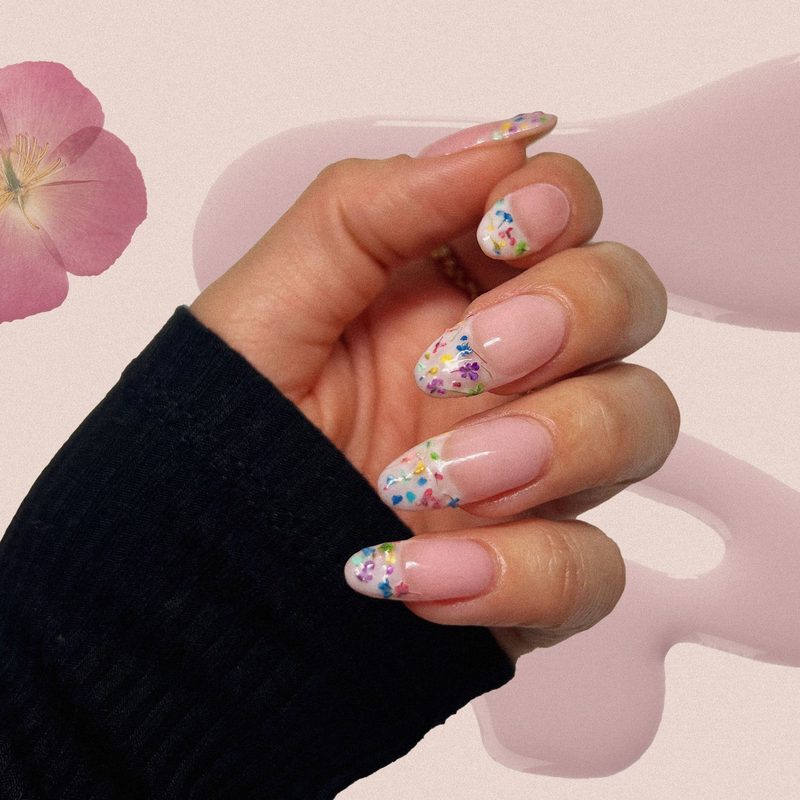 collection of trendy nail art pen designs including florals and abstract shapes