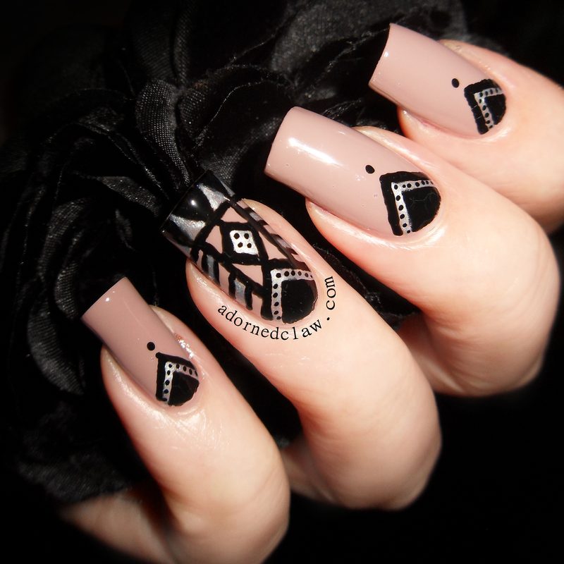 Colorful trendy nail art designs created with nail art pen featuring florals and geometric shapes