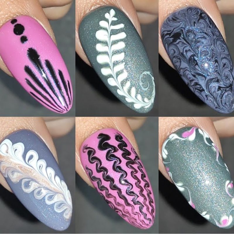 Creative nail art design featuring fine lines made with a liner brush