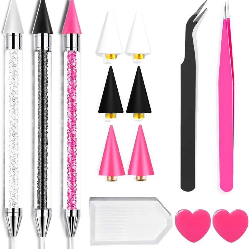 hand choosing from different nail art tool kits with brushes and tools