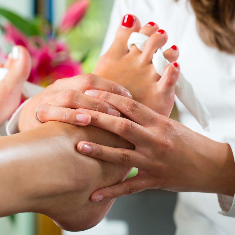 happy customers enjoying manicure services at nail salon