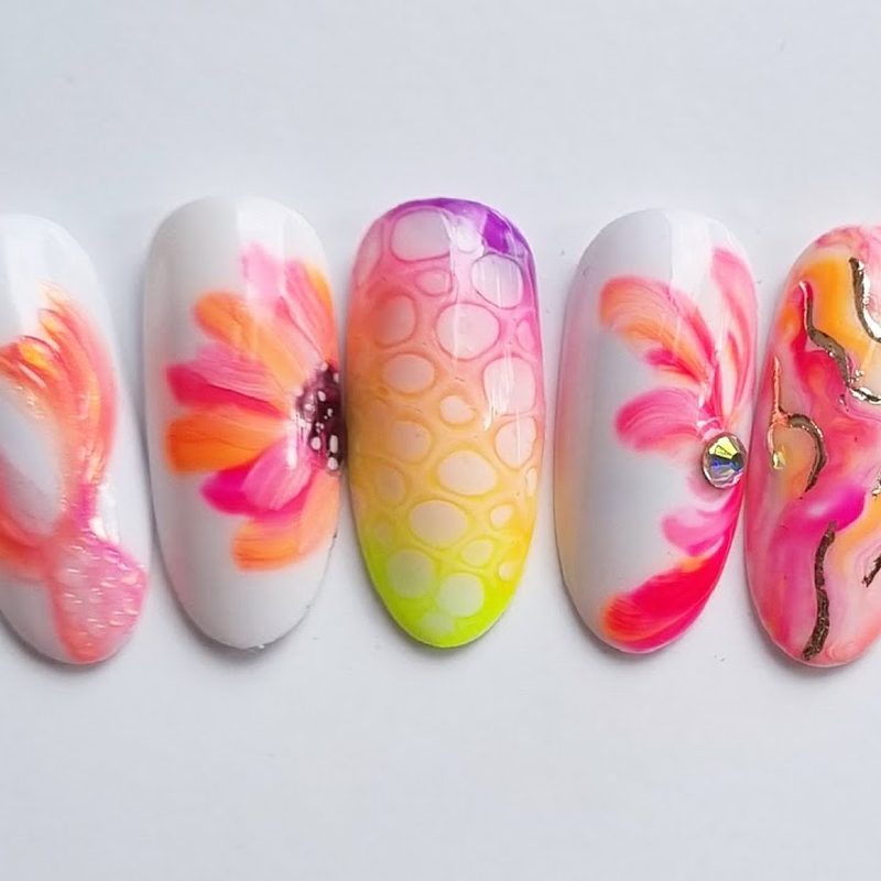 intricate floral nail art designed with fine detail brushes