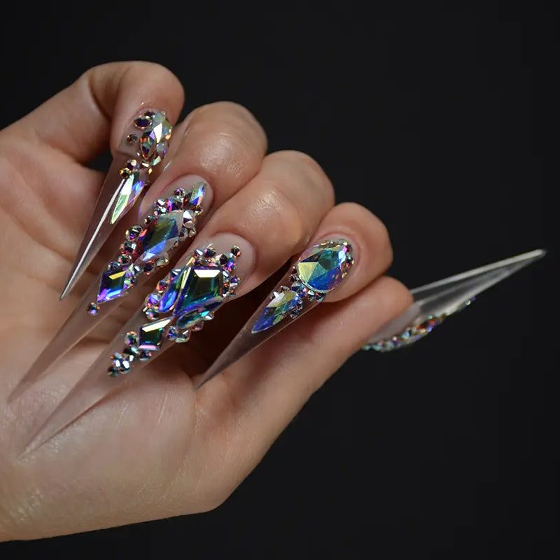 intricate swarovski crystal nail art designs on hand