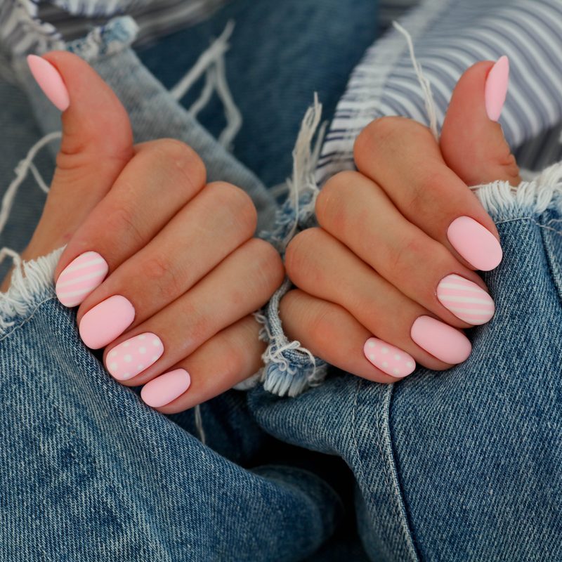 mixing nail polish colors on silicone mat for nail art