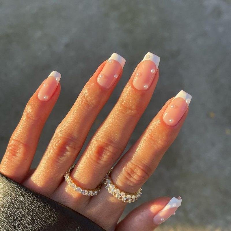 modern bridesmaid nails with floral and metallic accents