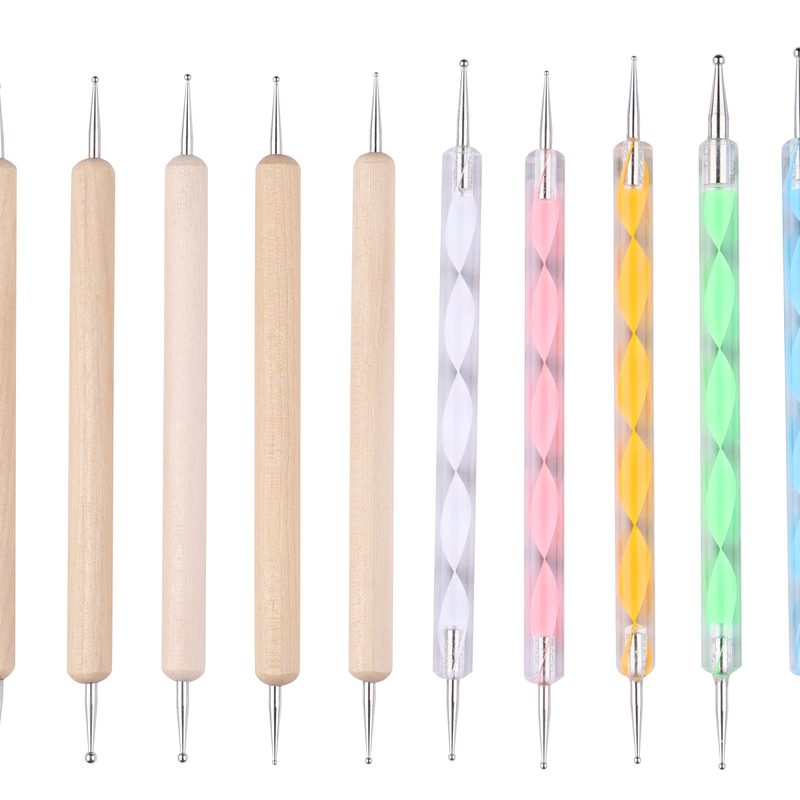 nail art tools including liner brush and dotting tools for beginner nail art