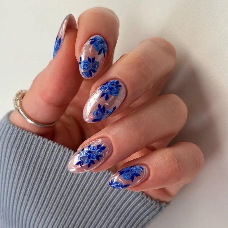 seasonal gel nail art blue manicures with color blocking and floral accents