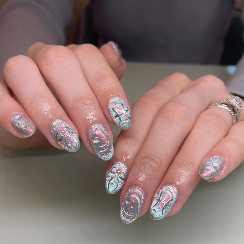 Seasonal Pisces nail art showcasing different colors and motifs for spring to winter