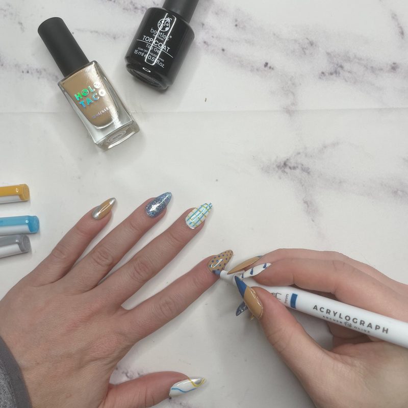 step-by-step nail art line drawing with a precision liner brush