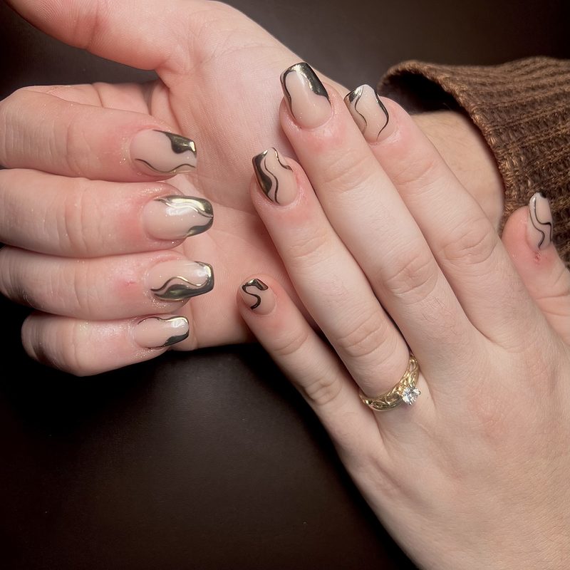 Subtle delicate nail art designs on short nails showcasing fine detailing