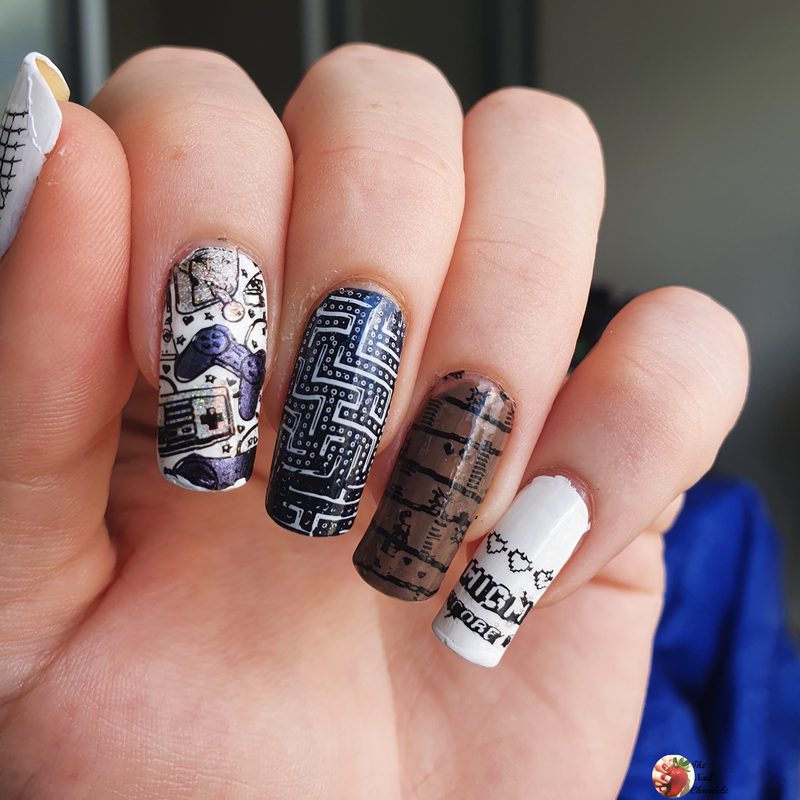 variety of nail art stamping plates showing different manicure designs