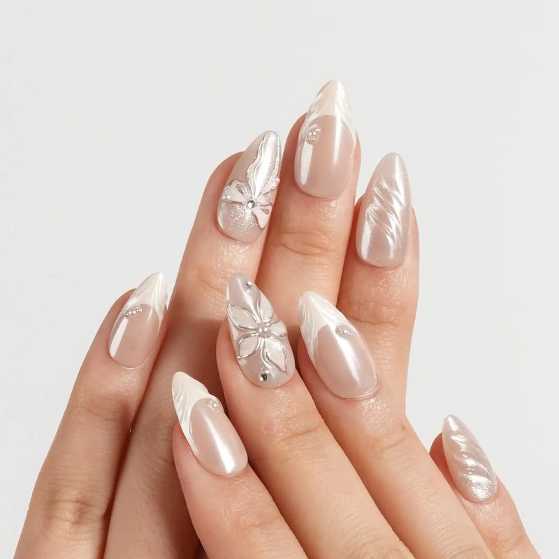 well-maintained nude nails with delicate nail art
