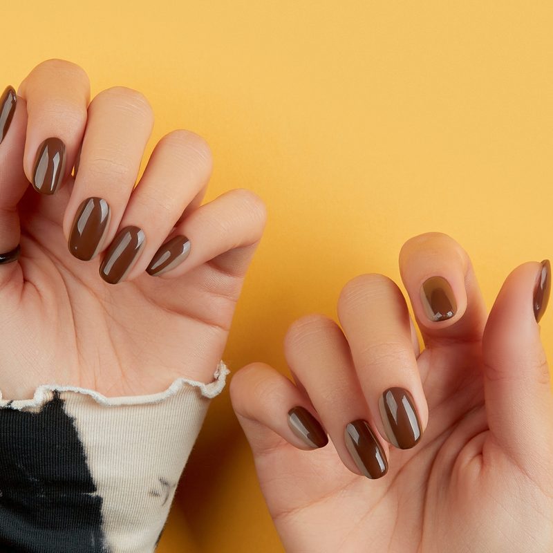 woman receiving level 1 nail art manicure at a nail salon