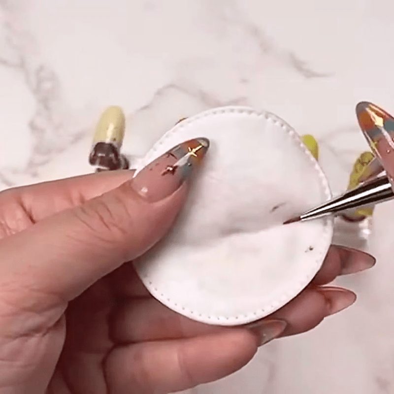 Cleaning a nail art paint brush with acetone