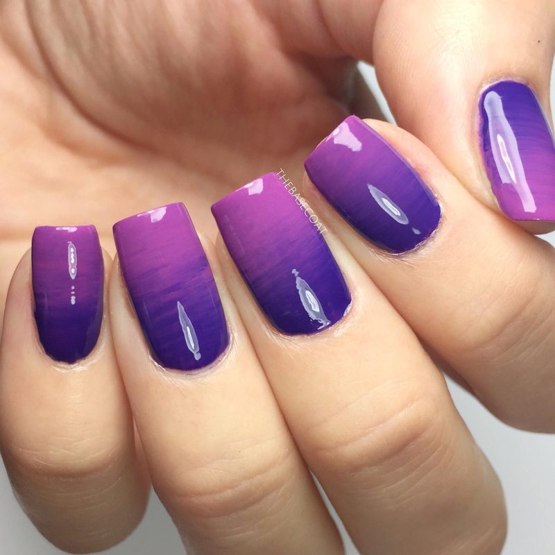 close-up of fan brush nail art tool creating textured nail designs