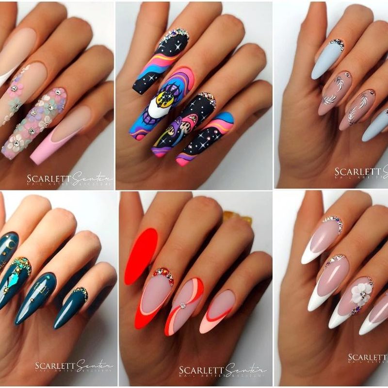 Close-up of nails with charms being cared for with a top coat application