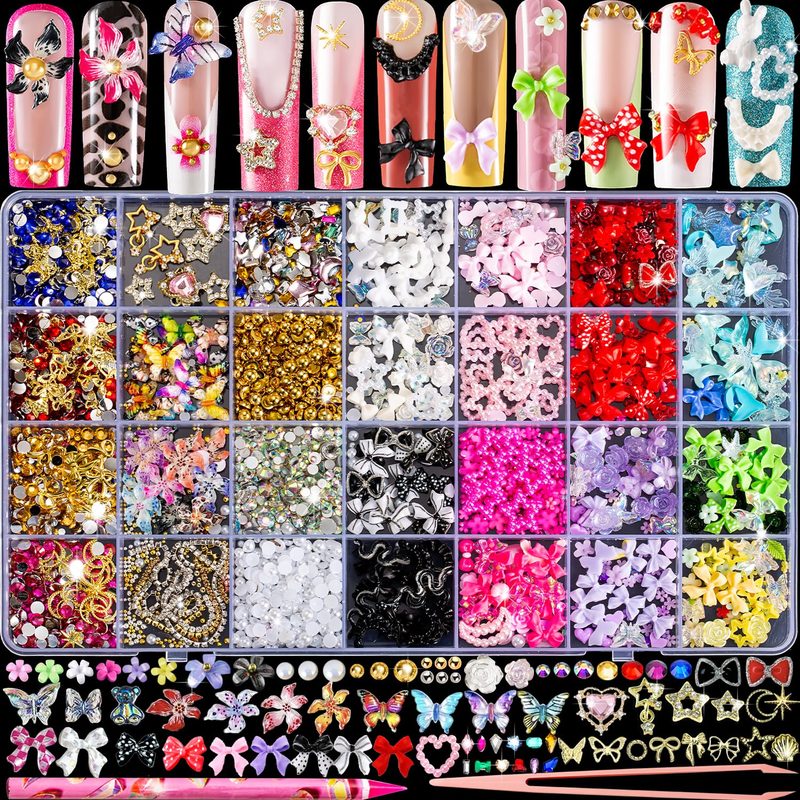 Collection of different nail art charms including rhinestones and metallic studs
