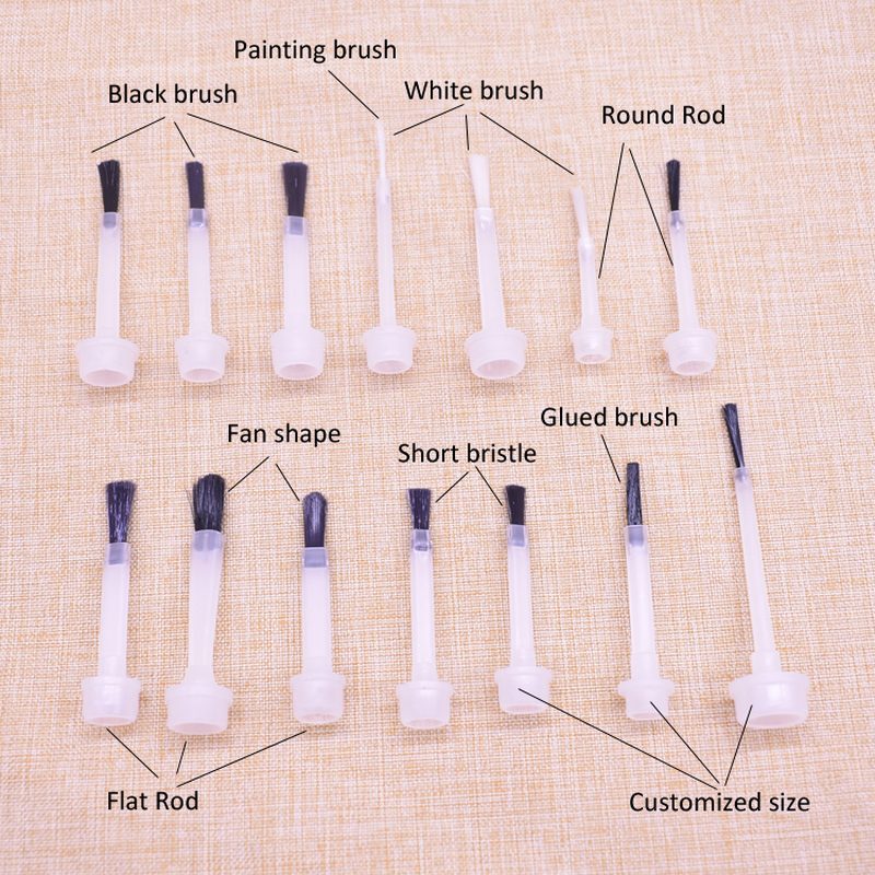 Different types of nail art paint brushes including thin brush and fan brush