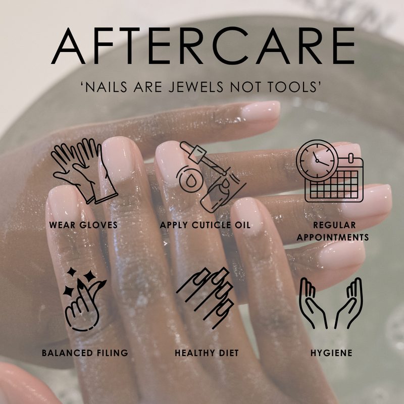 hands with painted nails receiving aftercare treatment at a nail salon