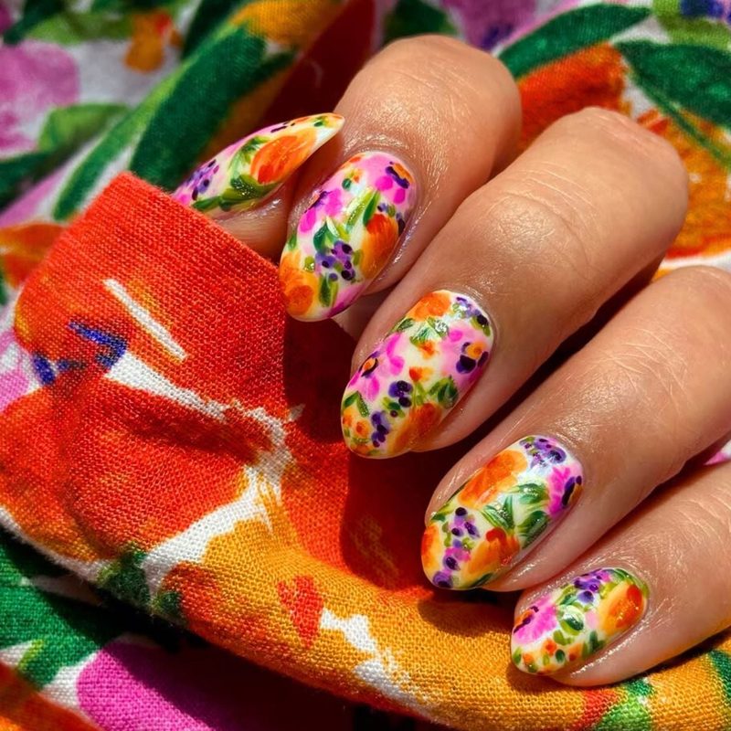intricate floral nail designs created with nail art paint gel