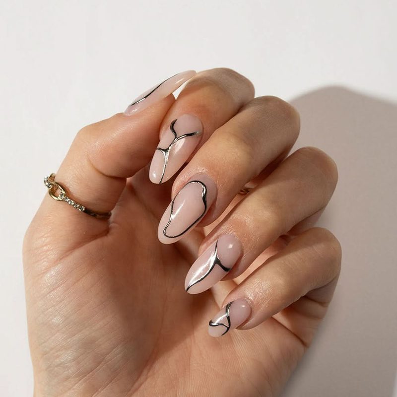 long liner brush creating detailed nail art designs