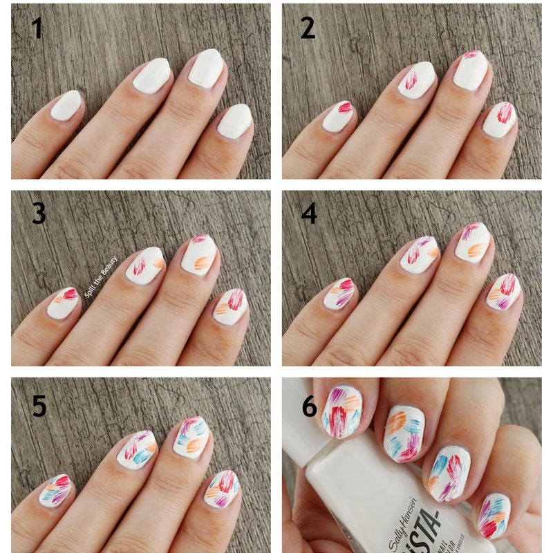 nail artist using thin brush techniques to paint intricate designs
