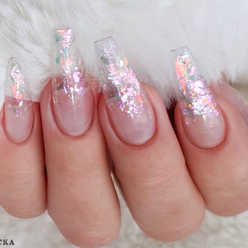 nail designs showcasing creative glitter flakes and nail art stickers