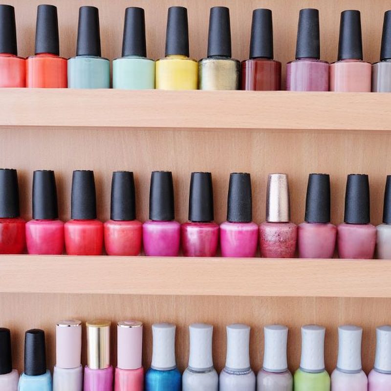 professional nail art product bottles neatly stored in a cool environment