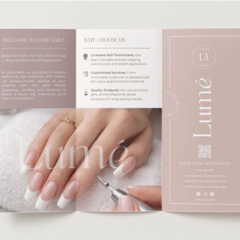 Professional nail artists creating custom nail art designs at a salon
