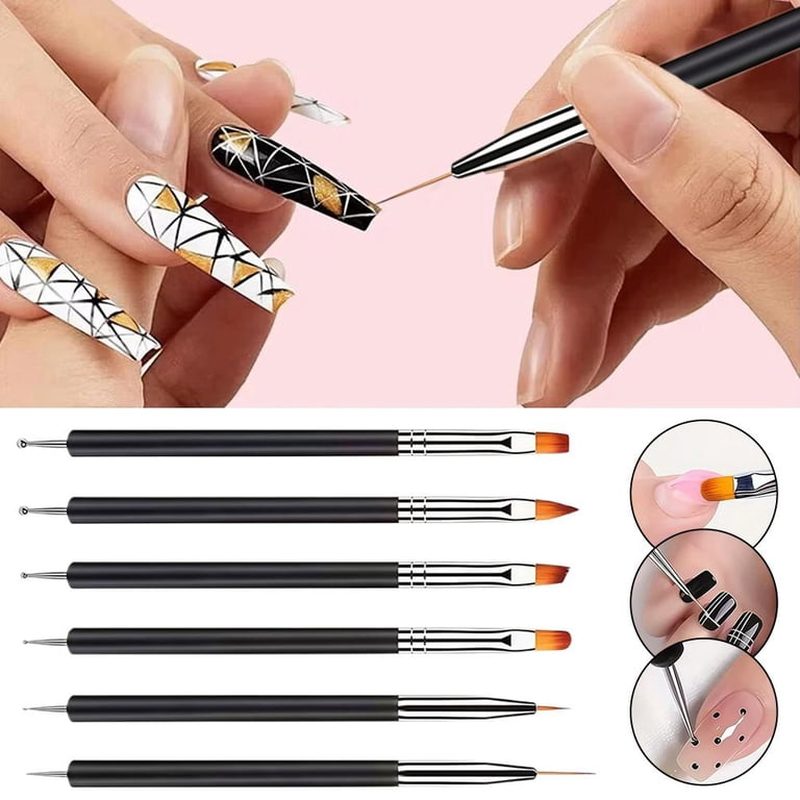 professional nail technician creating nail art with nail brushes in a salon